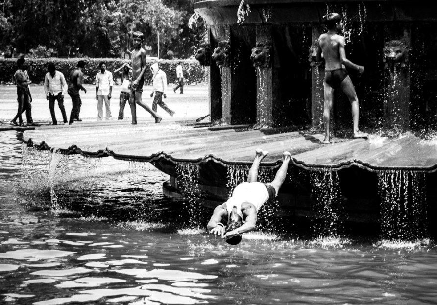 Boys swimming India Gate Delhi